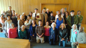 Friends standing/kneeling along the W wall of worship room